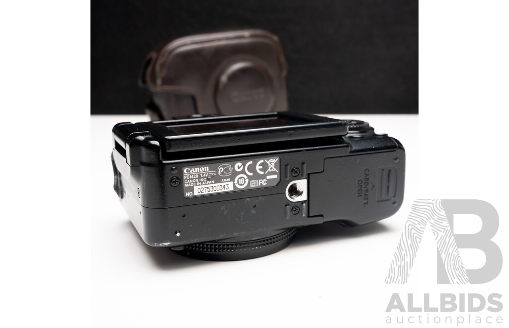 FujiFilm X-E1 Digital Camera with Fujinon Aspherical Super EBC XF 18–55mm F/2.8–4 Lens and Charger, with Canon PowerShot G11 Digital Camera with Leather Case and Charger