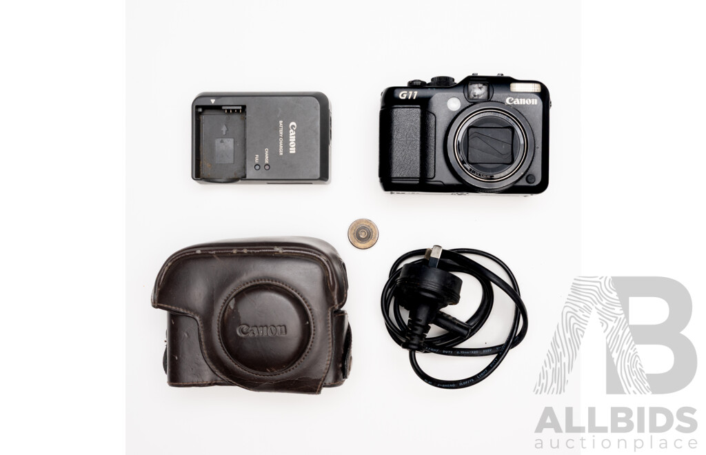 FujiFilm X-E1 Digital Camera with Fujinon Aspherical Super EBC XF 18–55mm F/2.8–4 Lens and Charger, with Canon PowerShot G11 Digital Camera with Leather Case and Charger