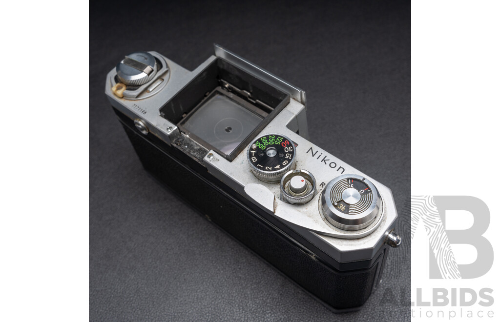 Nikon F Camera with 50mm F/1.4 Lens, Nikon 20mm F/3.5 Lens, Nikon 70–210mm F/4–5.6 Lens, Nikon 500mm F/8 Mirror Lens and Nikon CoolScan IV Digital Scanner