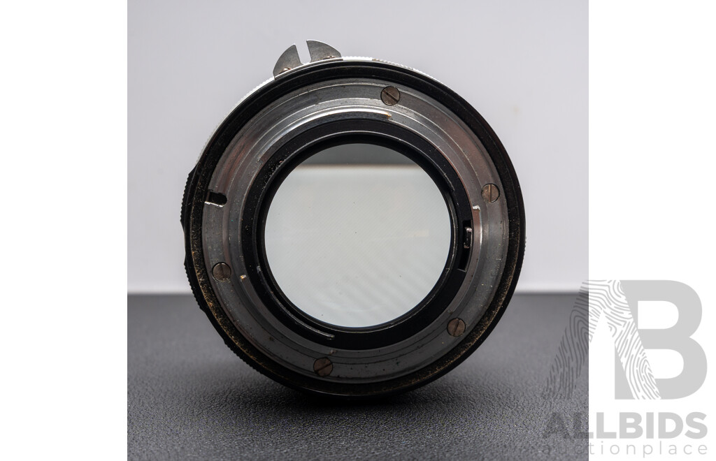 Nikon F Camera with 50mm F/1.4 Lens, Nikon 20mm F/3.5 Lens, Nikon 70–210mm F/4–5.6 Lens, Nikon 500mm F/8 Mirror Lens and Nikon CoolScan IV Digital Scanner