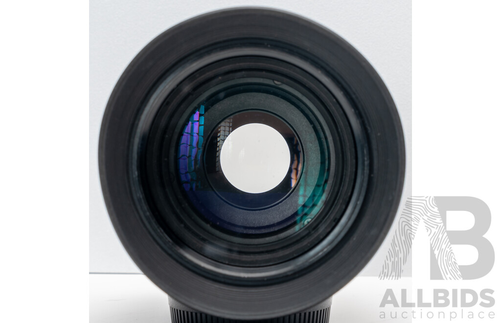 Nikon F Camera with 50mm F/1.4 Lens, Nikon 20mm F/3.5 Lens, Nikon 70–210mm F/4–5.6 Lens, Nikon 500mm F/8 Mirror Lens and Nikon CoolScan IV Digital Scanner