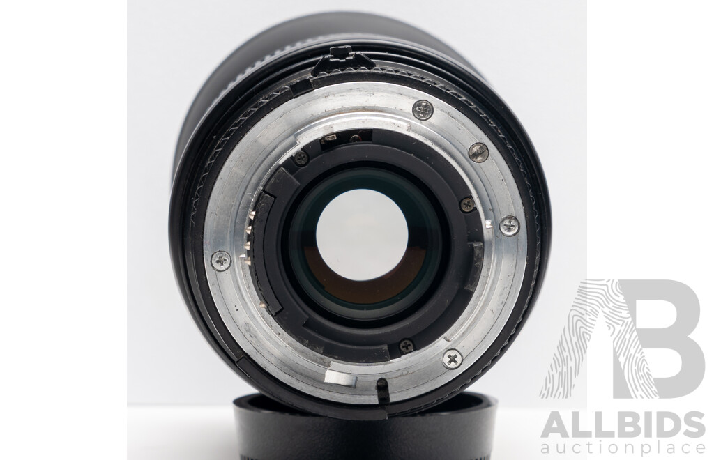 Nikon F Camera with 50mm F/1.4 Lens, Nikon 20mm F/3.5 Lens, Nikon 70–210mm F/4–5.6 Lens, Nikon 500mm F/8 Mirror Lens and Nikon CoolScan IV Digital Scanner