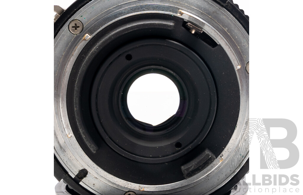 Nikon F Camera with 50mm F/1.4 Lens, Nikon 20mm F/3.5 Lens, Nikon 70–210mm F/4–5.6 Lens, Nikon 500mm F/8 Mirror Lens and Nikon CoolScan IV Digital Scanner