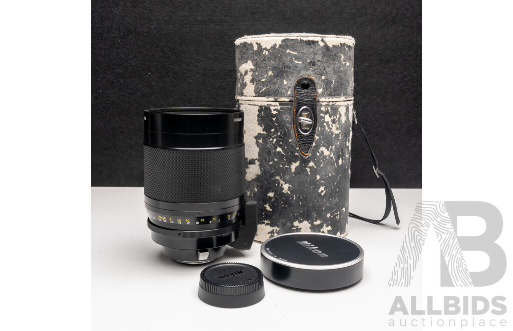 Nikon F Camera with 50mm F/1.4 Lens, Nikon 20mm F/3.5 Lens, Nikon 70–210mm F/4–5.6 Lens, Nikon 500mm F/8 Mirror Lens and Nikon CoolScan IV Digital Scanner