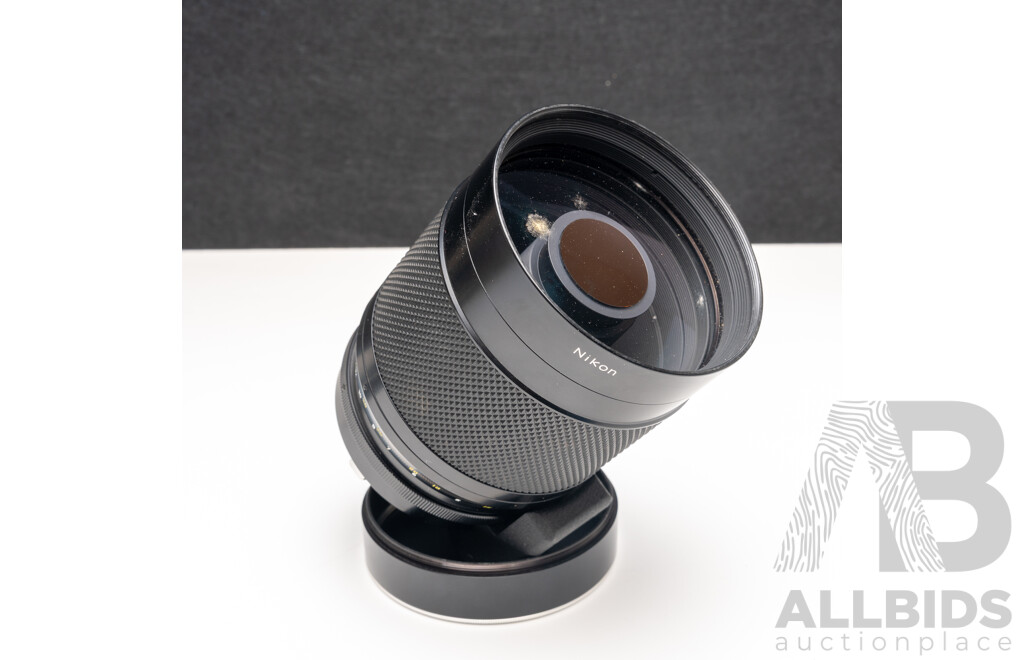 Nikon F Camera with 50mm F/1.4 Lens, Nikon 20mm F/3.5 Lens, Nikon 70–210mm F/4–5.6 Lens, Nikon 500mm F/8 Mirror Lens and Nikon CoolScan IV Digital Scanner