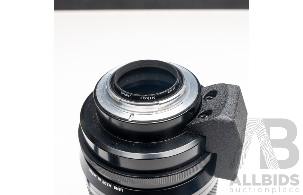 Nikon F Camera with 50mm F/1.4 Lens, Nikon 20mm F/3.5 Lens, Nikon 70–210mm F/4–5.6 Lens, Nikon 500mm F/8 Mirror Lens and Nikon CoolScan IV Digital Scanner