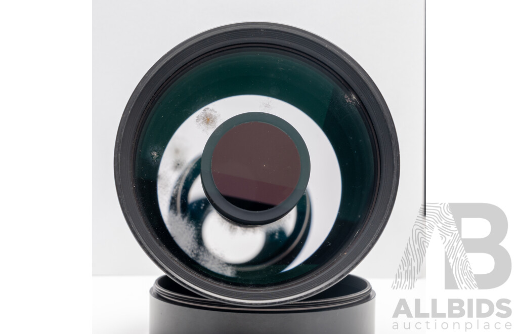 Nikon F Camera with 50mm F/1.4 Lens, Nikon 20mm F/3.5 Lens, Nikon 70–210mm F/4–5.6 Lens, Nikon 500mm F/8 Mirror Lens and Nikon CoolScan IV Digital Scanner