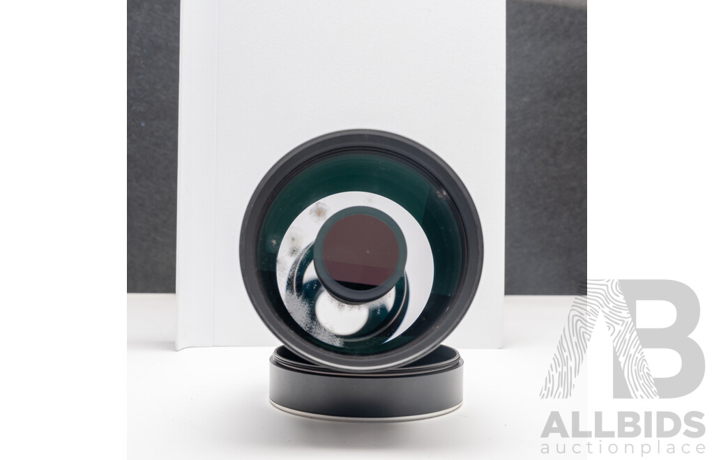 Nikon F Camera with 50mm F/1.4 Lens, Nikon 20mm F/3.5 Lens, Nikon 70–210mm F/4–5.6 Lens, Nikon 500mm F/8 Mirror Lens and Nikon CoolScan IV Digital Scanner