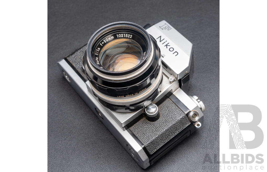 Nikon F Camera with 50mm F/1.4 Lens, Nikon 20mm F/3.5 Lens, Nikon 70–210mm F/4–5.6 Lens, Nikon 500mm F/8 Mirror Lens and Nikon CoolScan IV Digital Scanner