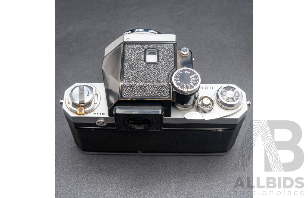 Nikon F Camera with 50mm F/1.4 Lens, Nikon 20mm F/3.5 Lens, Nikon 70–210mm F/4–5.6 Lens, Nikon 500mm F/8 Mirror Lens and Nikon CoolScan IV Digital Scanner