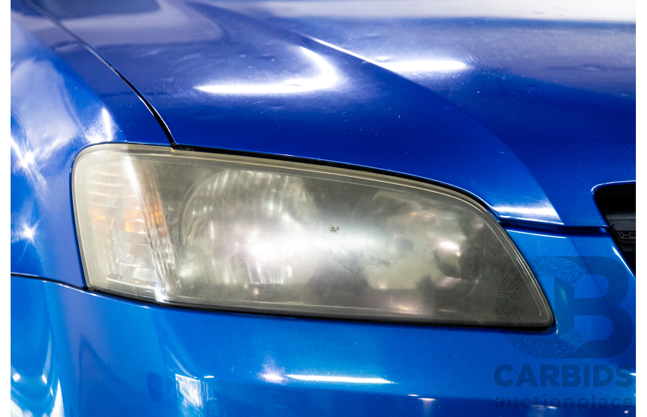 9/2009 Holden Commodore Omega VE MY10 4d Sedan Voodoo Blue Metallic V6 3.0L