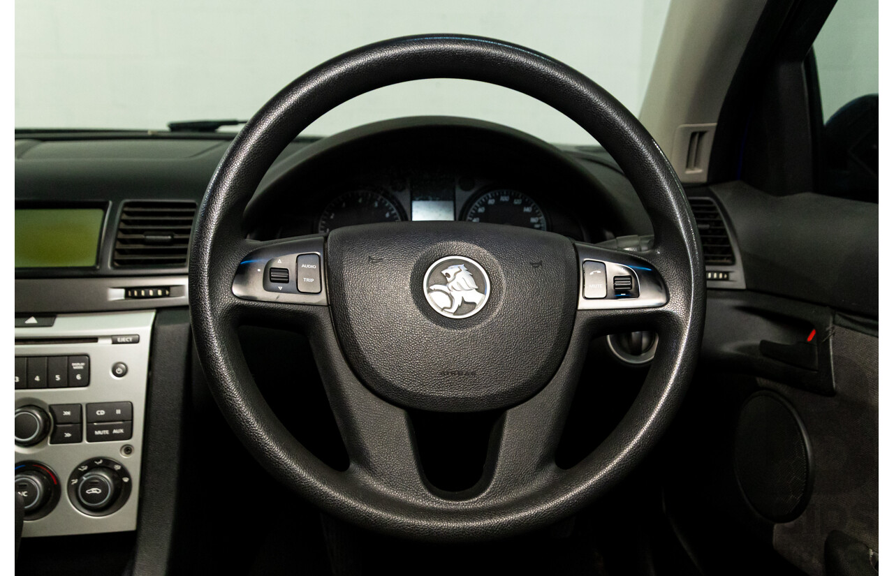 9/2009 Holden Commodore Omega VE MY10 4d Sedan Voodoo Blue Metallic V6 3.0L