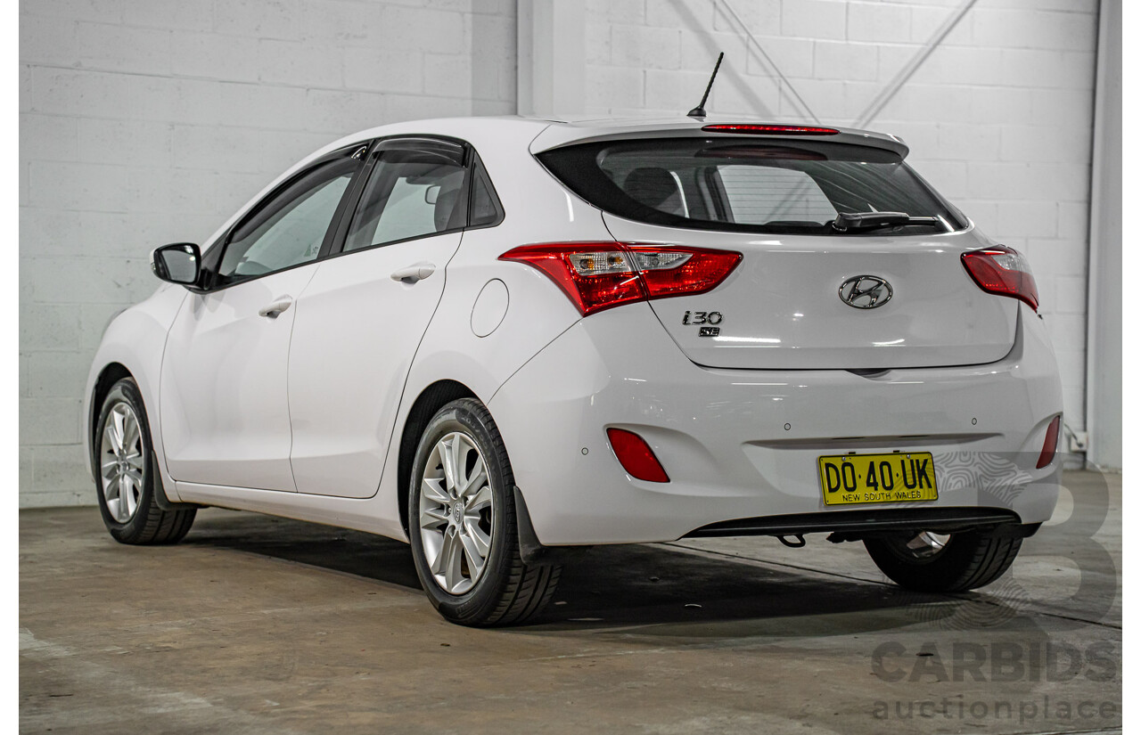 2/2015 Hyundai i30 SE GD MY14 5d Hatchback Creamy White 1.8L