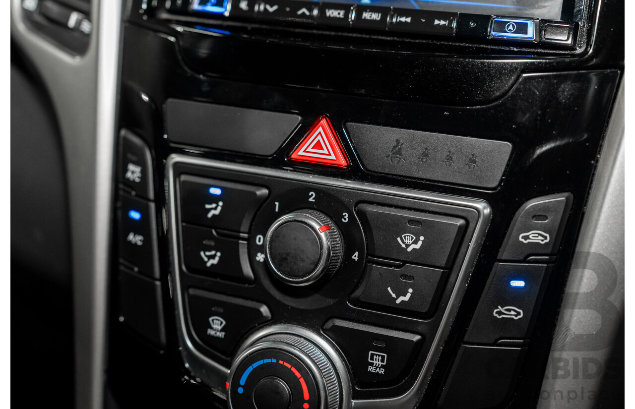 2/2015 Hyundai i30 SE GD MY14 5d Hatchback Creamy White 1.8L