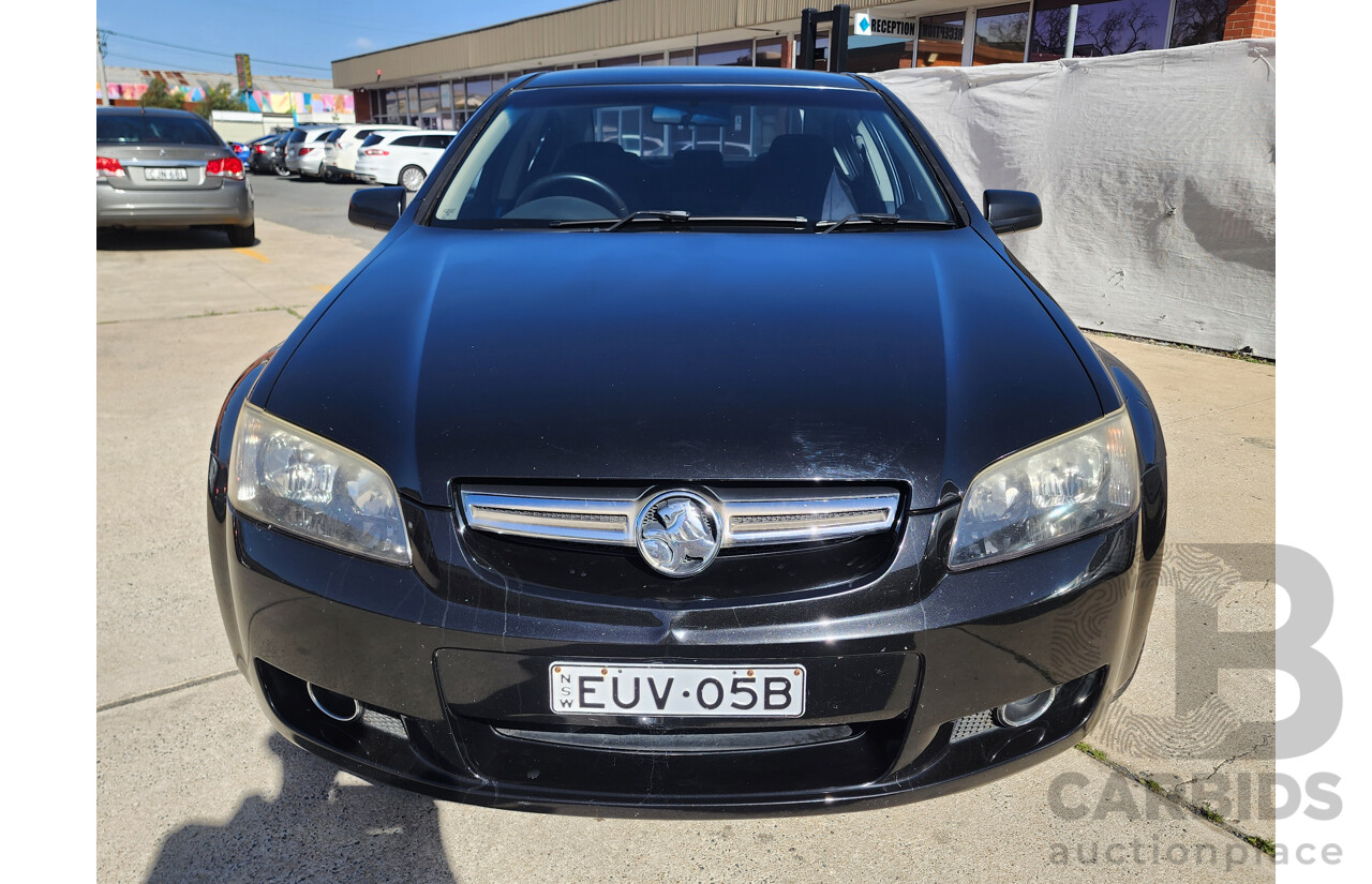 2/2010 Holden Berlina VE MY10 4d Sedan Black 3.0L