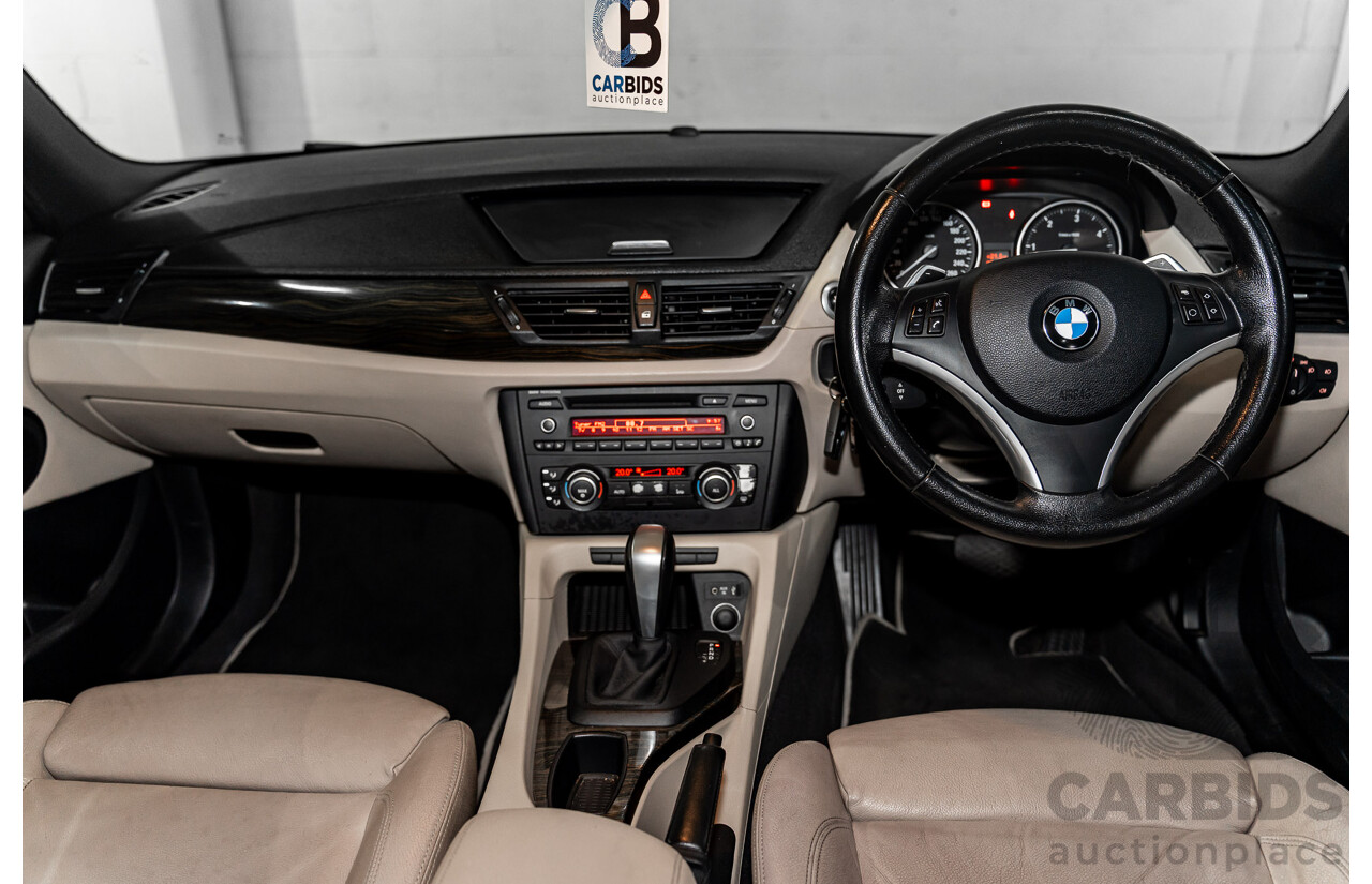 2/2011 BMW X1 xDrive23d E84 MY11 4d Wagon Deep Blue Sea Metallic Turbo Diesel 2.0L