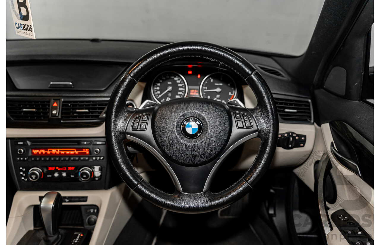 2/2011 BMW X1 xDrive23d E84 MY11 4d Wagon Deep Blue Sea Metallic Turbo Diesel 2.0L