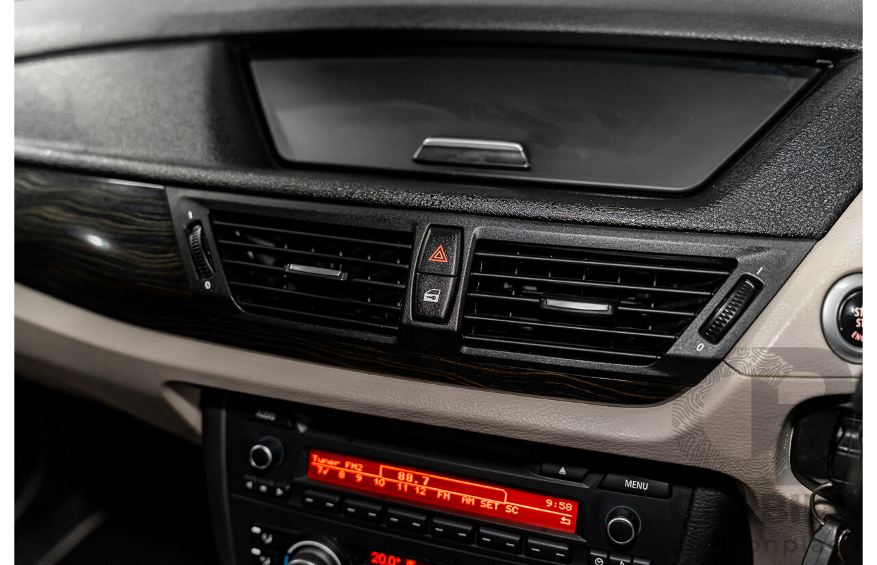 2/2011 BMW X1 xDrive23d E84 MY11 4d Wagon Deep Blue Sea Metallic Turbo Diesel 2.0L