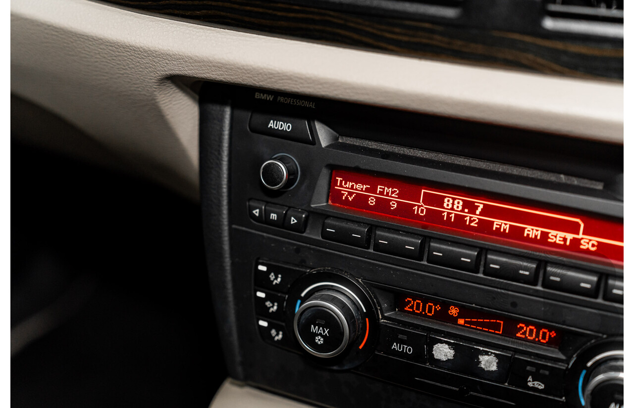 2/2011 BMW X1 xDrive23d E84 MY11 4d Wagon Deep Blue Sea Metallic Turbo Diesel 2.0L