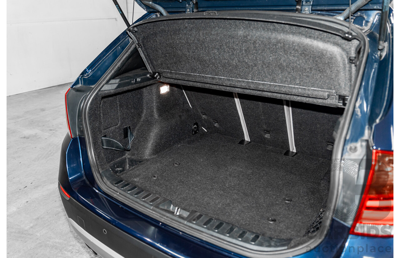 2/2011 BMW X1 xDrive23d E84 MY11 4d Wagon Deep Blue Sea Metallic Turbo Diesel 2.0L