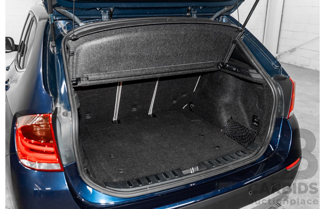 2/2011 BMW X1 xDrive23d E84 MY11 4d Wagon Deep Blue Sea Metallic Turbo Diesel 2.0L