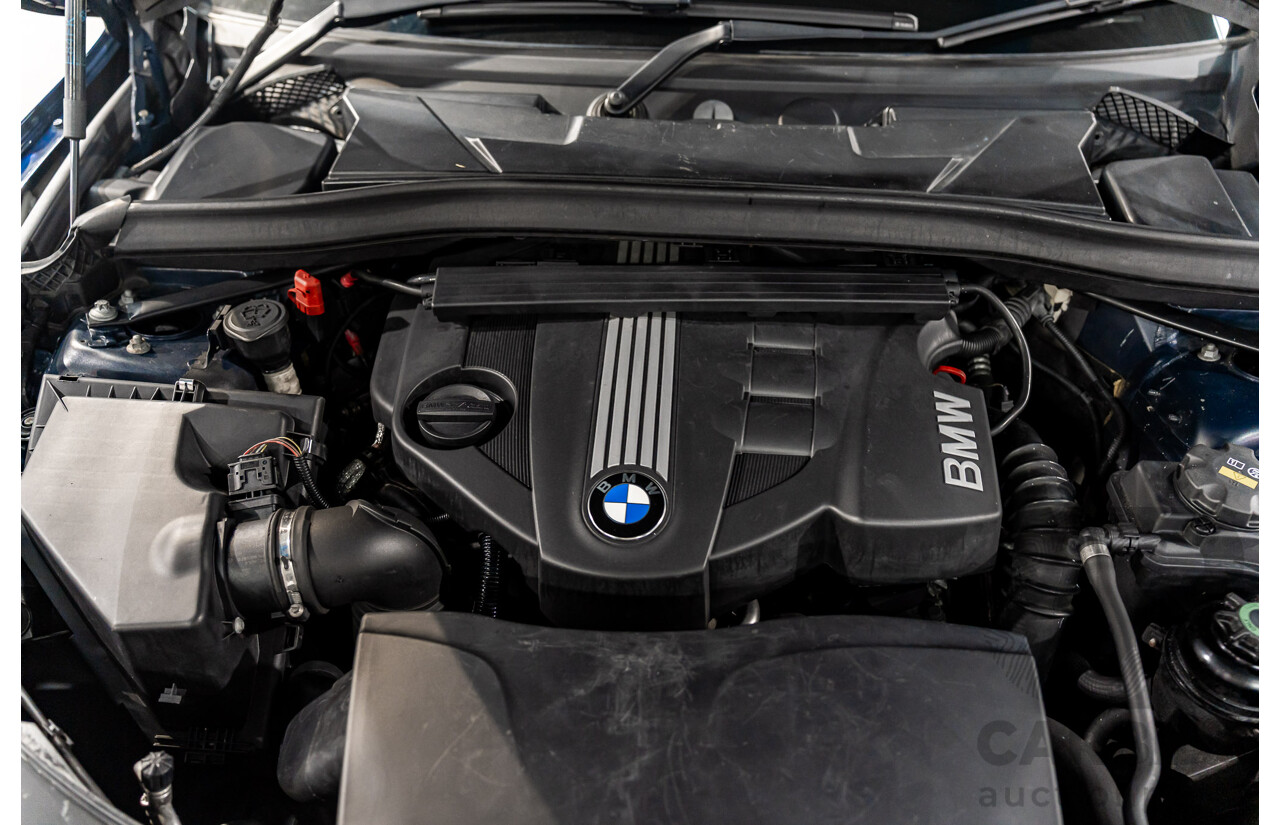 2/2011 BMW X1 xDrive23d E84 MY11 4d Wagon Deep Blue Sea Metallic Turbo Diesel 2.0L