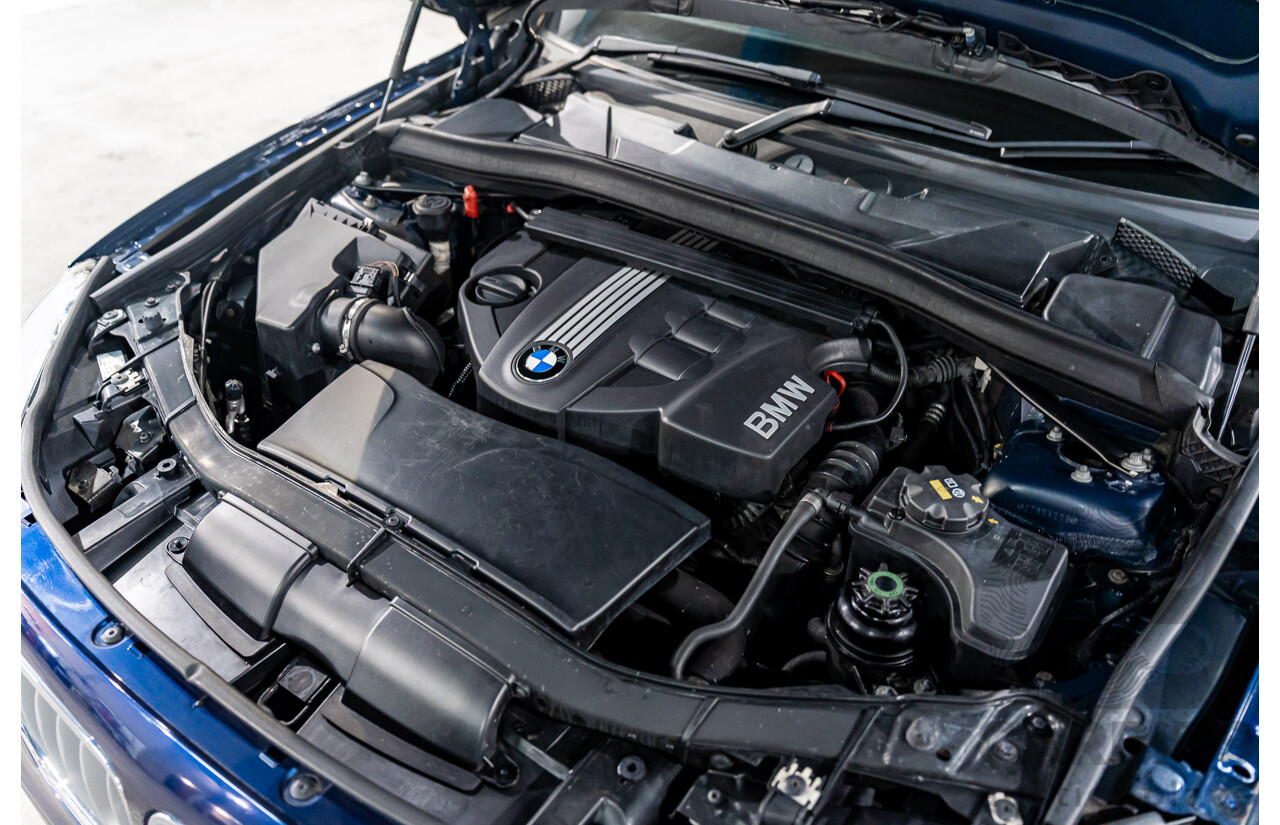 2/2011 BMW X1 xDrive23d E84 MY11 4d Wagon Deep Blue Sea Metallic Turbo Diesel 2.0L