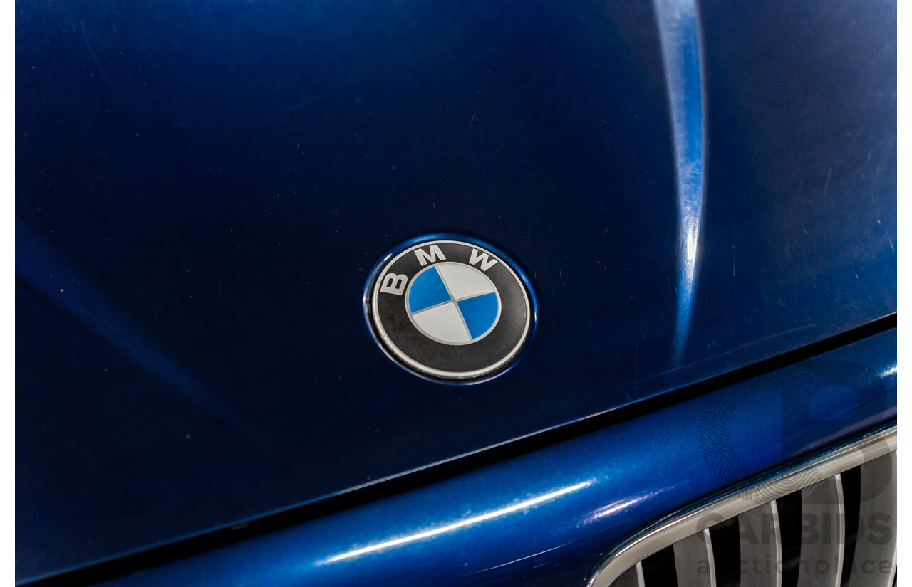 2/2011 BMW X1 xDrive23d E84 MY11 4d Wagon Deep Blue Sea Metallic Turbo Diesel 2.0L