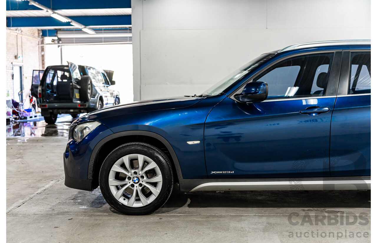2/2011 BMW X1 xDrive23d E84 MY11 4d Wagon Deep Blue Sea Metallic Turbo Diesel 2.0L