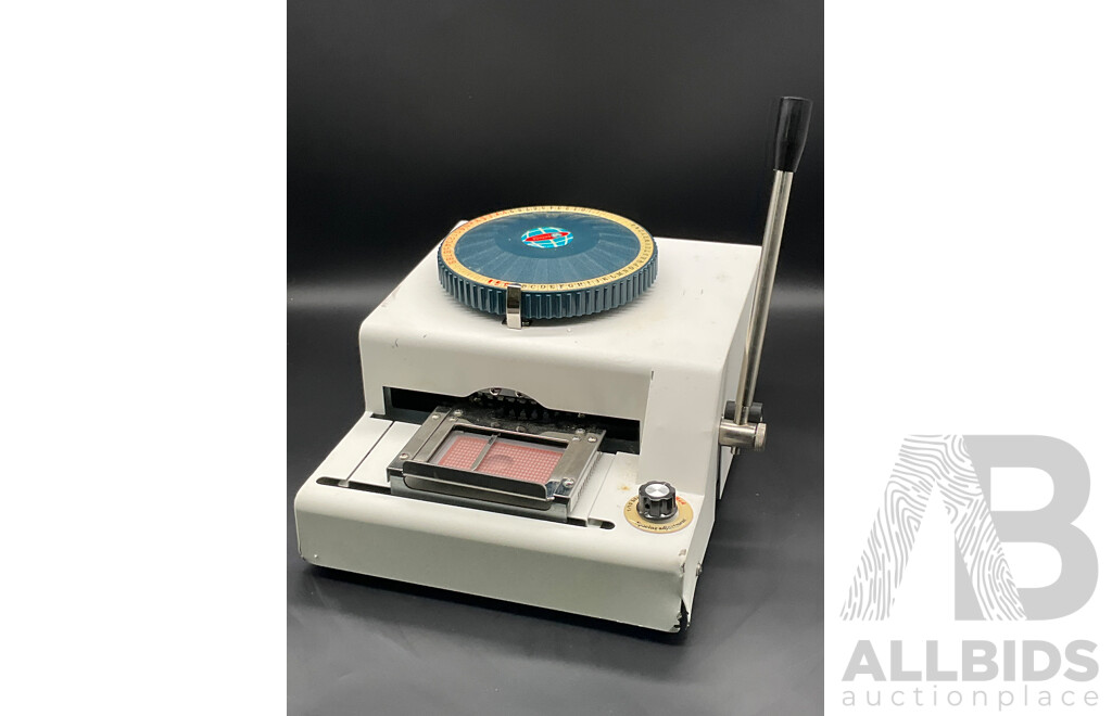 Manual Metal Embossing Machine Used to Create Identification Tags