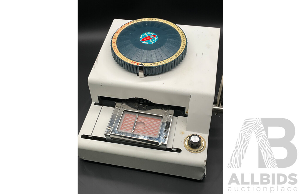 Manual Metal Embossing Machine Used to Create Identification Tags