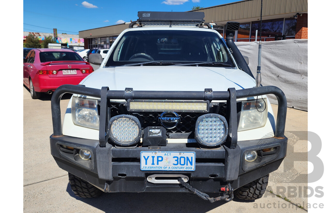 2/2009 Nissan Navara RX (4x4) D40 Dual Cab P/Up White 2.5L