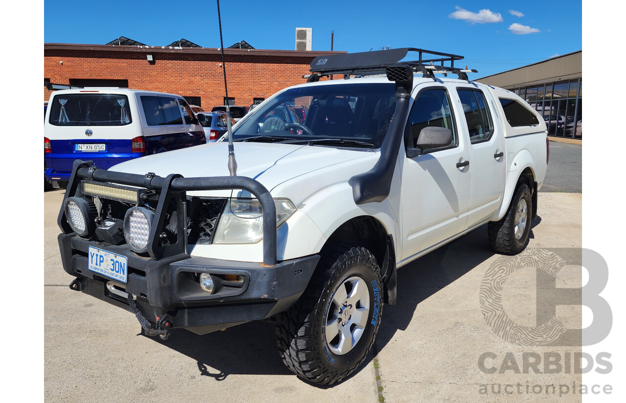 2/2009 Nissan Navara RX (4x4) D40 Dual Cab P/Up White 2.5L
