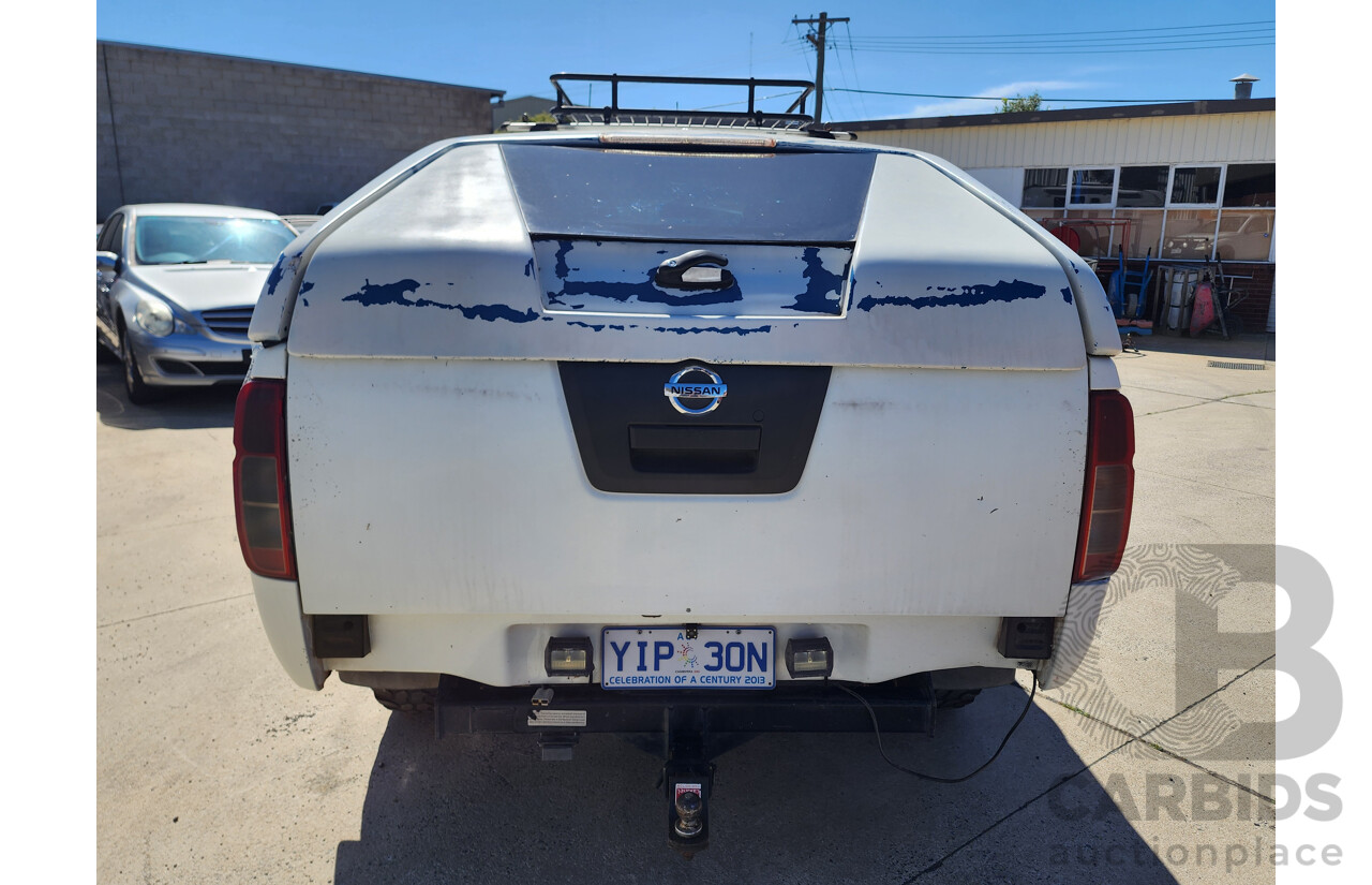 2/2009 Nissan Navara RX (4x4) D40 Dual Cab P/Up White 2.5L
