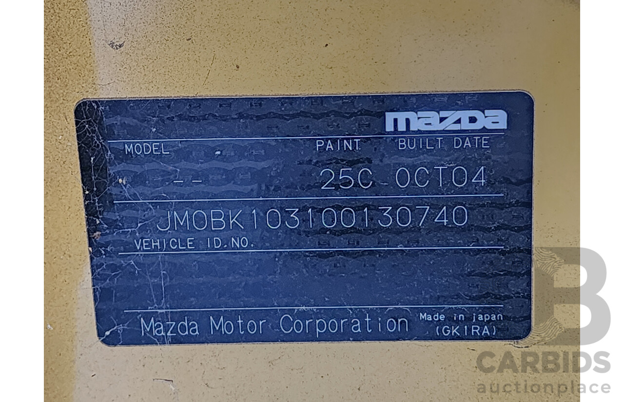 11/2004 Mazda Mazda3 SP23 BK 5d Hatchback Yellow 2.3L